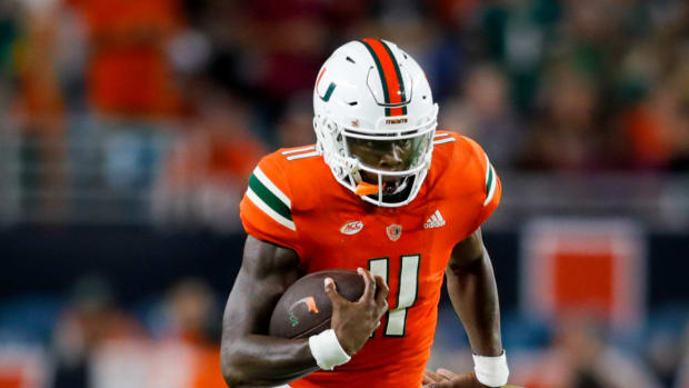 Miami Hurricanes quarterback Jacurri Brown (11)